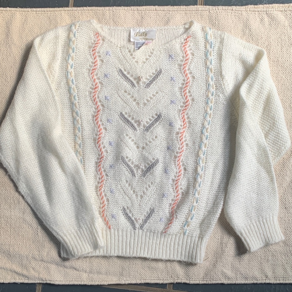 Sweet & Feminine sweater with Gorgeous details throughout front